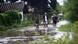 En la imagen varias personas caminan por una calle anegada de agua a causa de las lluvias.
En la imagen varias personas caminan por una calle anegada de agua a causa de las lluvias.