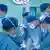 Chinese surgeons performing xenotransplantation of a pig kidney in 2024