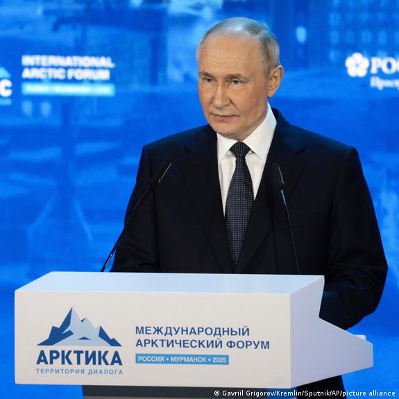 Putin speaking at a podium