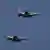 Drei Kampfflugzeuge fliegen in einer Formation