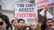 Turkish students gather and hold up signs that say "You can't arrest everyone" Turkish students gather and hold up signs that say "You can't arrest everyone"
