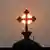 Indien | Kirchenkreuz bei Sonnenaufgang

