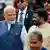 Sri Lanka's President Anura Kumara Dissanayake (center R) speaks to India's Prime Minister Narendra Modi (L) during the latter's ceremonial reception at the Independence Square in Colombo on April 5, 2025
