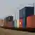 Containers are transported by train near the Deendayal Port in Kandla, in the western state of Gujarat, India