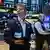 Traders work on the floor of the New York Stock Exchange (NYSE), on April 8, 2025