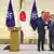 NATO Secretary General Mark Rutte shakes hands with Japanese PM Ishiba Shigeru