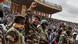 General Abdourahamane Tiani (with raised fist), the head of the military regime in Niger, greets thousands of people who gathered at the largest stadium in Niamey.
General Abdourahamane Tiani (with raised fist), the head of the military regime in Niger, greets thousands of people who gathered at the largest stadium in Niamey.