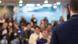 Symbolbild | Konferenz mit Redner auf Podium und Publikum im Saal