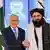 Pakistan's Foreign Minister Ishaq Dar (left) shaking hands with his Afghanistan counterpart Amir Khan Muttaqi (right) during a bilateral meeting in Kabul on April 19