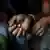 A file photo of a child laborer's hands