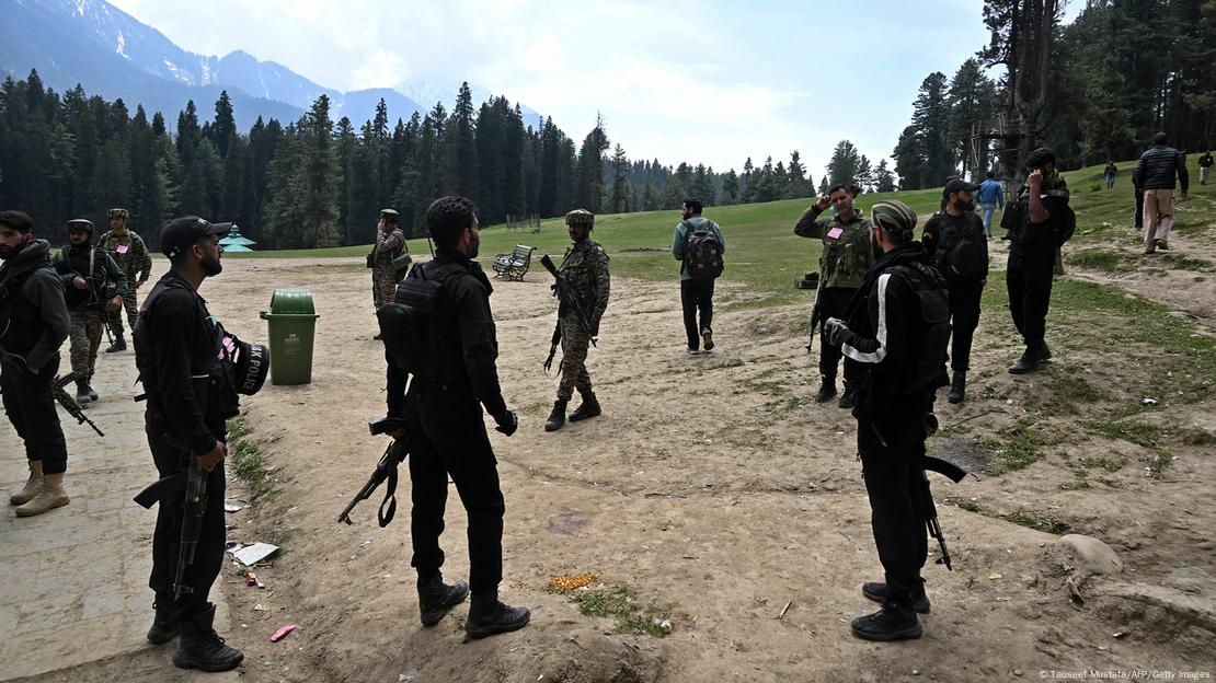 A screenshot of security personnel in a field