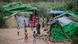 Karen refugees in a temporary camp on the Myanmar side of the Moei River which forms the border with Thailand (2022 file photo) Karen refugees in a temporary camp on the Myanmar side of the Moei River which forms the border with Thailand (2022 file photo)