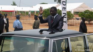 Traveling in a limousine, Faure Gnassingbe waves to supporters
Traveling in a limousine, Faure Gnassingbe waves to supporters