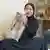 Nita Agustina bersama kucing yang dirawatnya