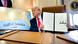 US President Donald Trump, holds up the signed executive order renaming the Gulf of Mexico as the Gulf of America during a flight on Air Force One US President Donald Trump, holds up the signed executive order renaming the Gulf of Mexico as the Gulf of America during a flight on Air Force One