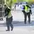Police officers work on-site a day after a deadly shooting, at Vaksala Square, in Uppsala, Sweden April 30, 2025