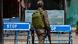 An Indian paramilitary trooper patrols in Srinagar, the summer capital of Jammu and Kashmir An Indian paramilitary trooper patrols in Srinagar, the summer capital of Jammu and Kashmir