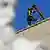 A worker installs the chimney on the roof of the Sistine Chapel on May 2, 2025.