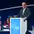 Der designierte Bundeskanzler Merz steht am Rednerpult und spricht auf dem EVP-Kongress