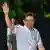 Singapore's Prime Minister Lawrence Wong of the People's Action Party (PAP) gestures as he arrives at the party's gathering awaiting the vote count for the general election in Singapore