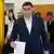 Presidential candidate George Simion, right, casts his vote next to Calin Georgescu, winner of the first round of last year's annulled election on 04.05.2025.
