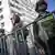 Police officers stand guard outside the Peruvian Prosecutor's building in Lima