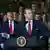 US Secretary of Defence, Pete Hegseth, speaks as US President Donald Trump (L) looks on during remarks to the Michigan National Guard at Selfridge Air National Guard Base in Warren, Michigan, on April 29, 2025