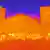 'Heat image' of a city square, with several buildings and a crowd of people, showing in orange and red where temperatures are the hottest