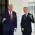US President Donald Trump and Canadian Prime Minister Mark Carney gesture as they meet at the White House in Washington, DC, US