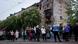 Local residents wait for a tram in front of a residential building, damaged after a Russian strike, in Kyiv, Ukraine, on Wednesday, May 7, 2025 Local residents wait for a tram in front of a residential building, damaged after a Russian strike, in Kyiv, Ukraine, on Wednesday, May 7, 2025