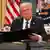 President Donald Trump signs an executive order
