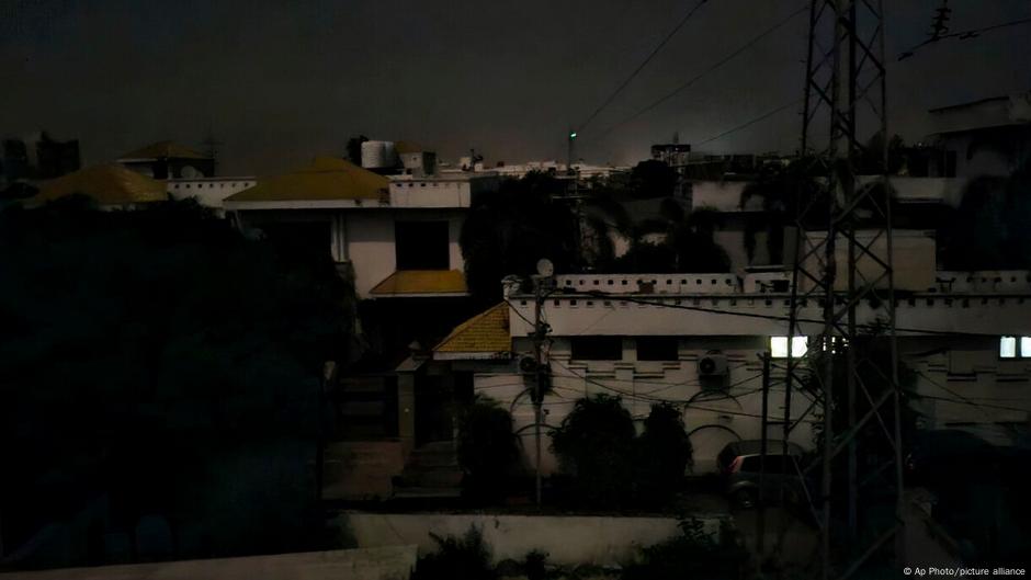 Pakistan denies border attacks as India reports blackout sirens. (10 words)