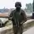 An Indian soldier stands guard in Indian-administered Kashmir on May 9, 2025