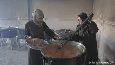 Women in Gaza soup kitchen prepare vat of soup Women in Gaza soup kitchen prepare vat of soup