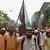 Anti-AL protesters wave flags and shout slogans in Dhaka, Bangladesh on May 9, 2025