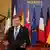 Germany's Foreign Minister Johann Wadephul speaking in front of the flags of several European countries