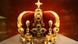 A golden crown made of red velvet and set with gemstones A golden crown made of red velvet and set with gemstones