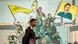 A man walks past a mural depicting supporters of the Syrian Democratic Forces (SDF), one of them raising a flag showing the face of Abdullah Ocalan -- founding member of the militant Kurdistan Workers' Party (PKK) outlawed by Turkey, in Syria's northeastern city of Qamishli on December 16, 2024. A man walks past a mural depicting supporters of the Syrian Democratic Forces (SDF), one of them raising a flag showing the face of Abdullah Ocalan -- founding member of the militant Kurdistan Workers' Party (PKK) outlawed by Turkey, in Syria's northeastern city of Qamishli on December 16, 2024.
