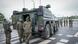 Żołnierze Bundeswehry przy transporterze opancerzonym Żołnierze Bundeswehry przy transporterze opancerzonym