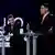 Los candidatos Dan y Simion, durante un debate televisado.