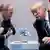 Russian President Vladimir Putin sand US President Donald Trump speak during a meeting in 2017