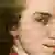 Mozarts halbes Gesicht hinter transparentem Notenpapier. 
