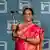 Banu Mushtaq holding International Booker Prize trophy.