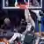 Isaiah Hartenstein dunking a ball against the Minnesota Timberwolves