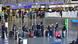 People with their luggage at Frankfurt Airport
People with their luggage at Frankfurt Airport