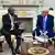 South African President Cyril Ramaphosa (left) talks as he looks at US President Donald Trump (right) in the Oval Office on May 21, 2025