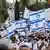 Ativistas agitam bandeiras de Israel em Jerusalém Oriental