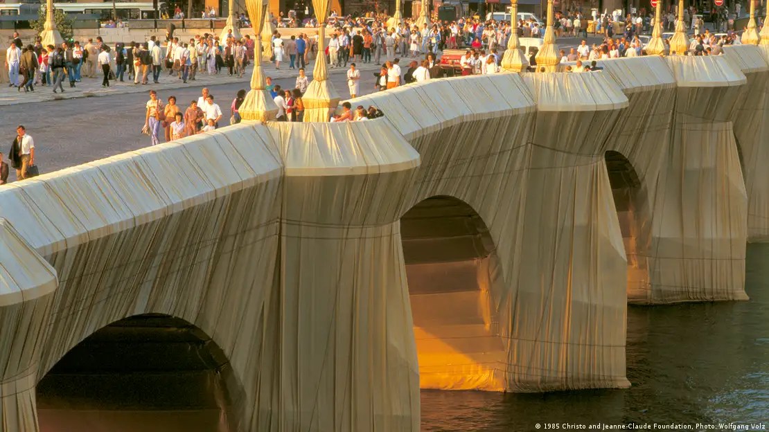 Artist JR's wrapped bridge opens in Paris in nod to Christo
