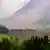 A wide shot of the avalanche that swept down the Alpine valley in Blatten, Switzerland