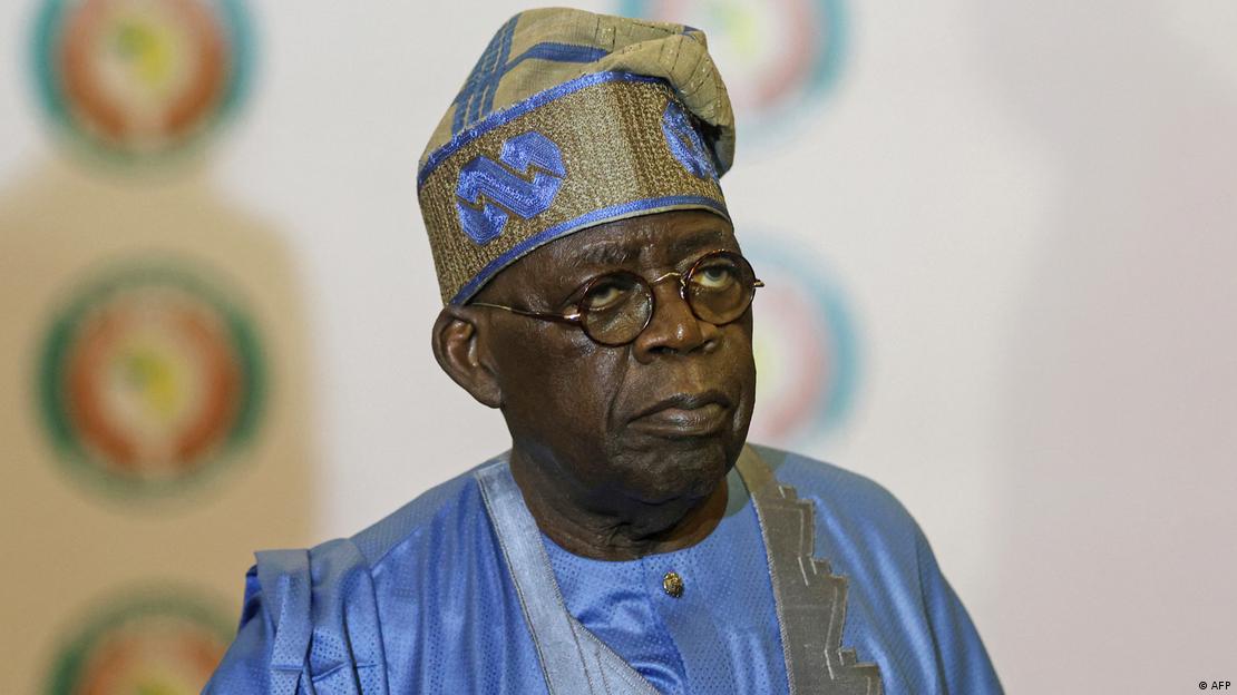 Nigeria's President Bola Ahmed wearing a light blue gown